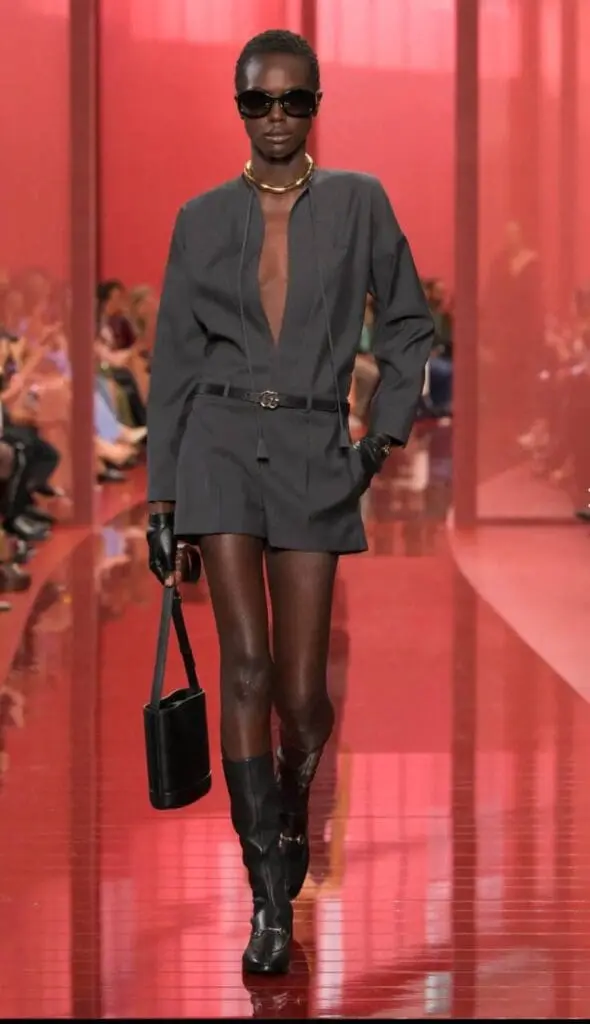 Gucci Spring 2025 model in belted mini suit dress and boots