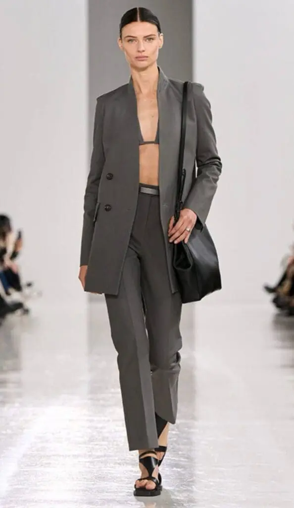 Model in structured grey suit with bandeau top from MaxMara 2025