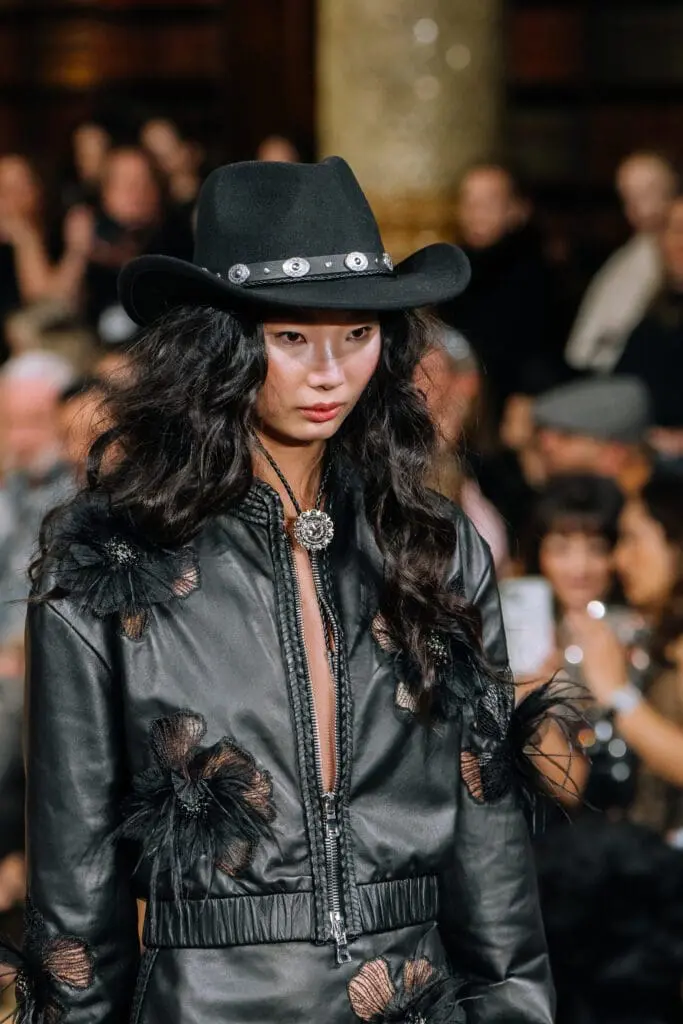 Black leather jacket dress with floral appliqué