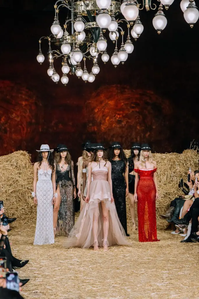 Finale lineup of models in cowboy hats at LFW