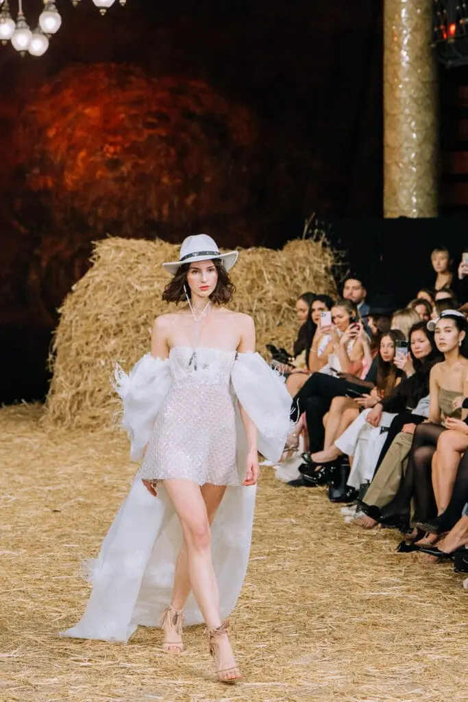 White mini dress with train, white cowboy hat