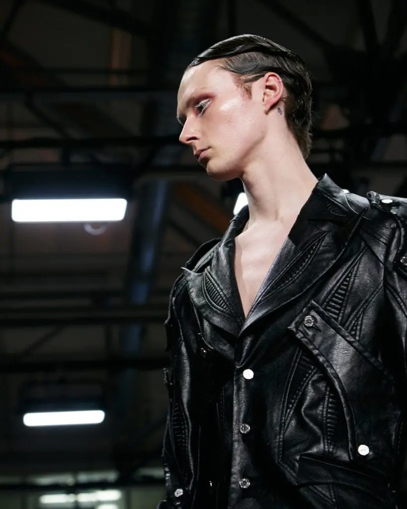 Angus Tsui monochrome futuristic outfit on runway