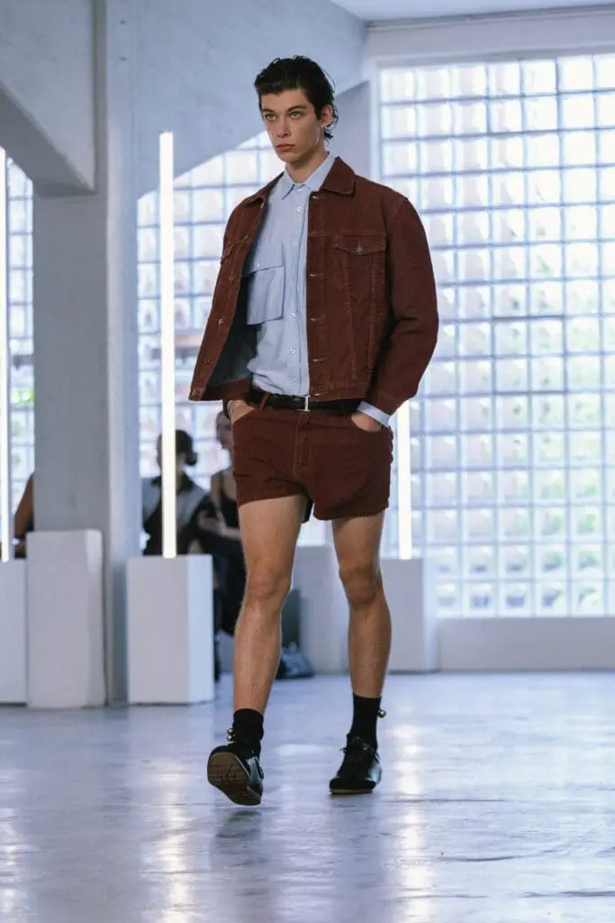 Side view of brown denim jacket runway SS26