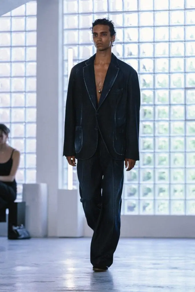 Oversized dark denim suit on runway SS26