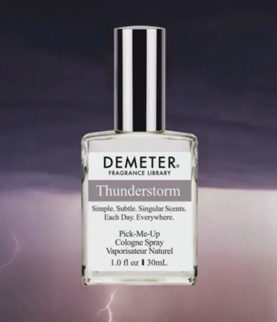Demeter Fragrance Library’s Thunderstorm bottle in front of dramatic lightning sky
