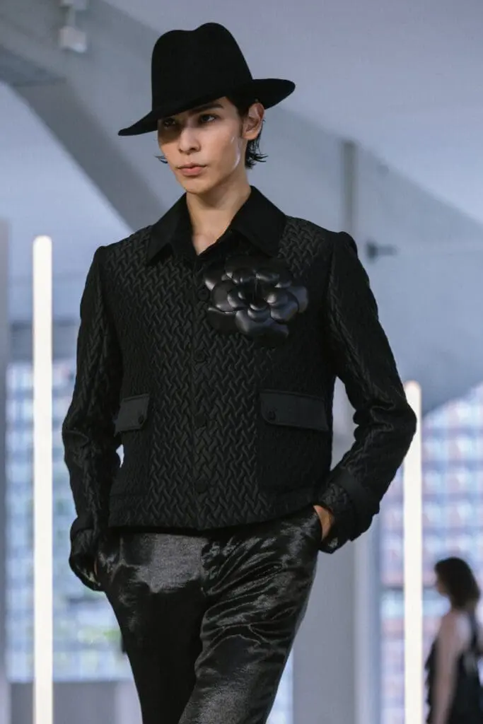 Model in moonlit style at Miguel Vieira SS26 runway