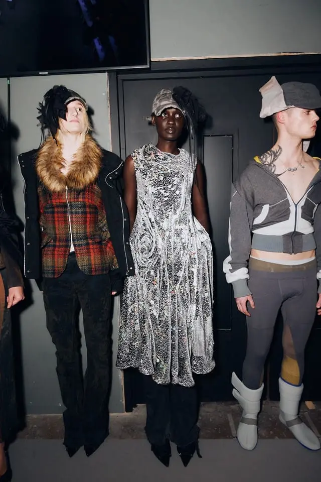 Three models in tweeds and AI-bug influenced textiles from Petra Fagerstrom’s Recollection//404