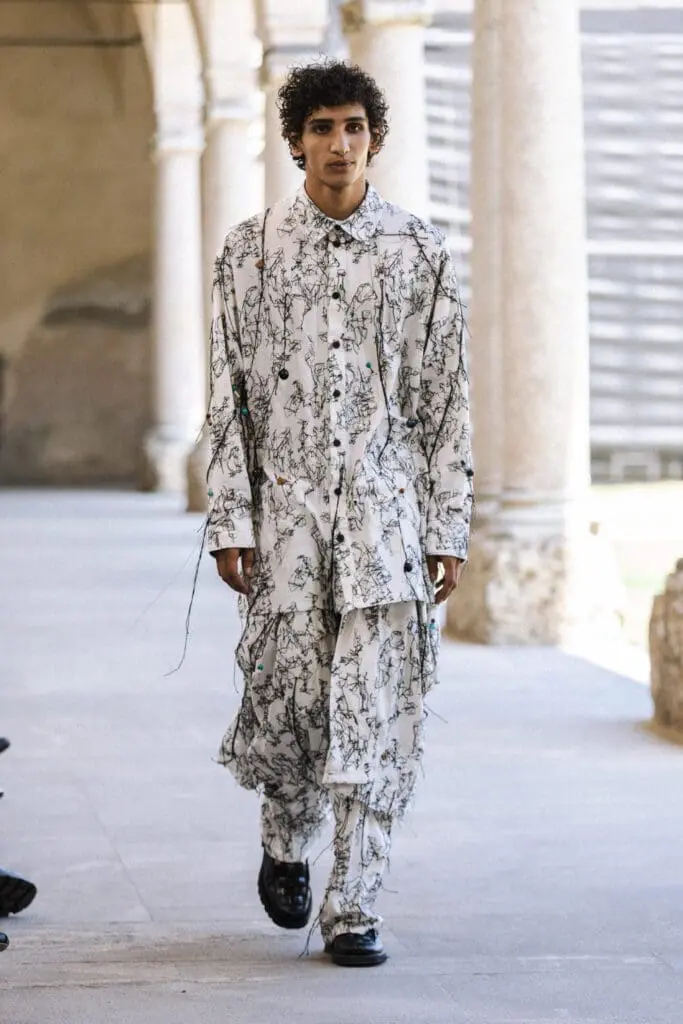 Black pleated coat look QASIMI SS26 MFW