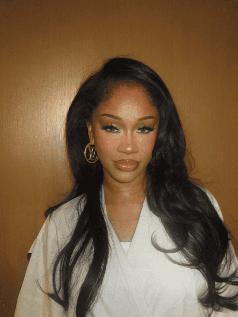 Saweetie in soft glam makeup with dramatic lashes and peachy blush