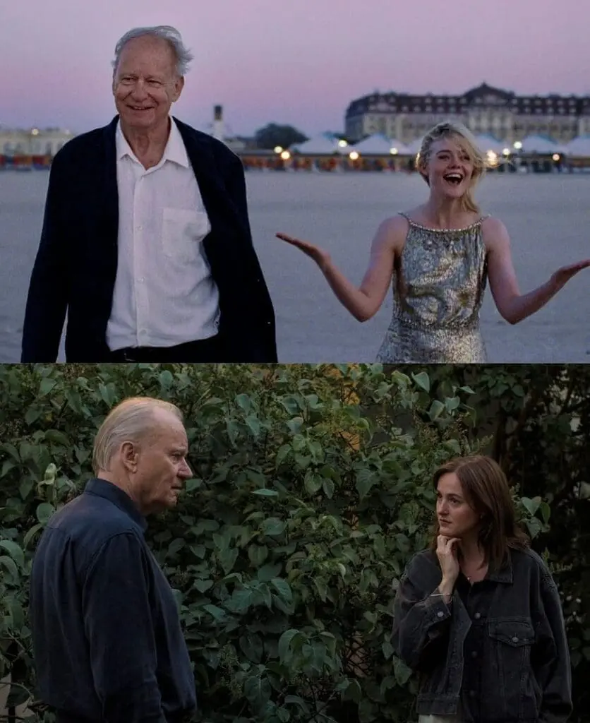 Older man and young woman smiling and gesturing playfully on a beach at dusk