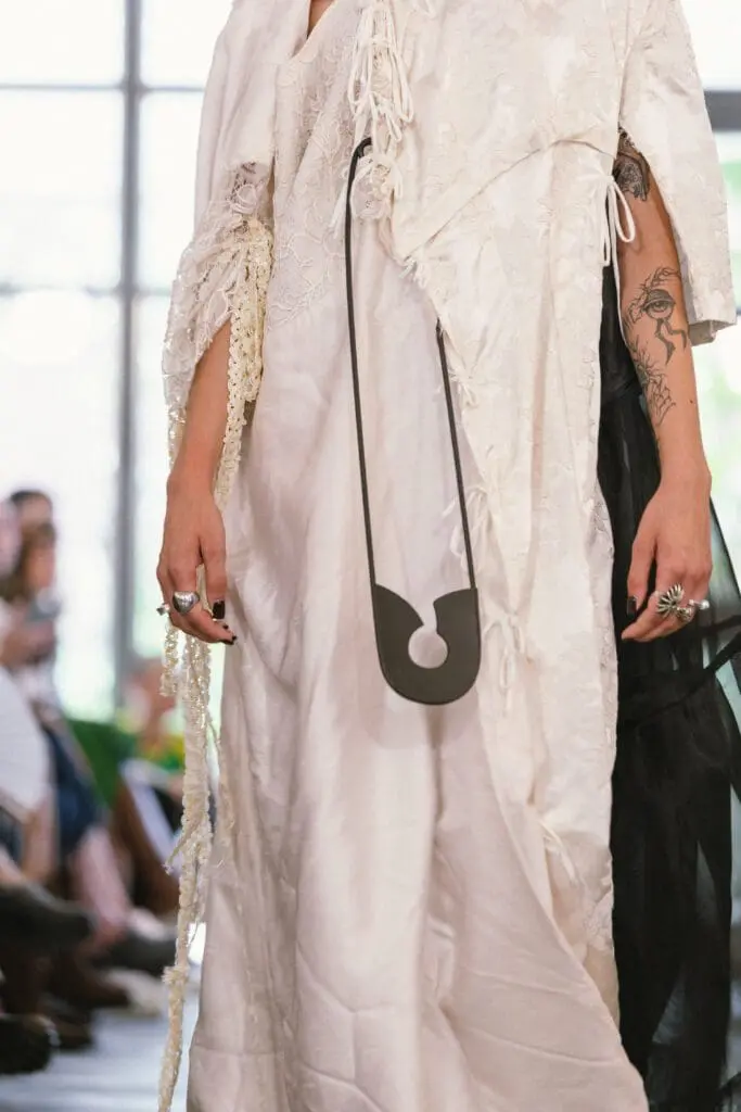 Layered bleached look from Simon Cracker SS26 Milan