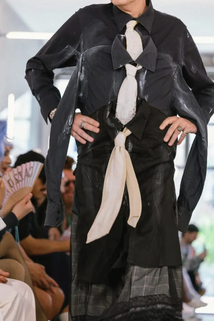 Stark white minimalist runway look Simon Cracker SS26