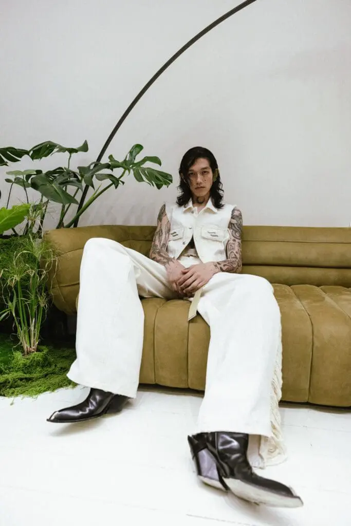 Model in white vest and wide pants SSHEENA SS26