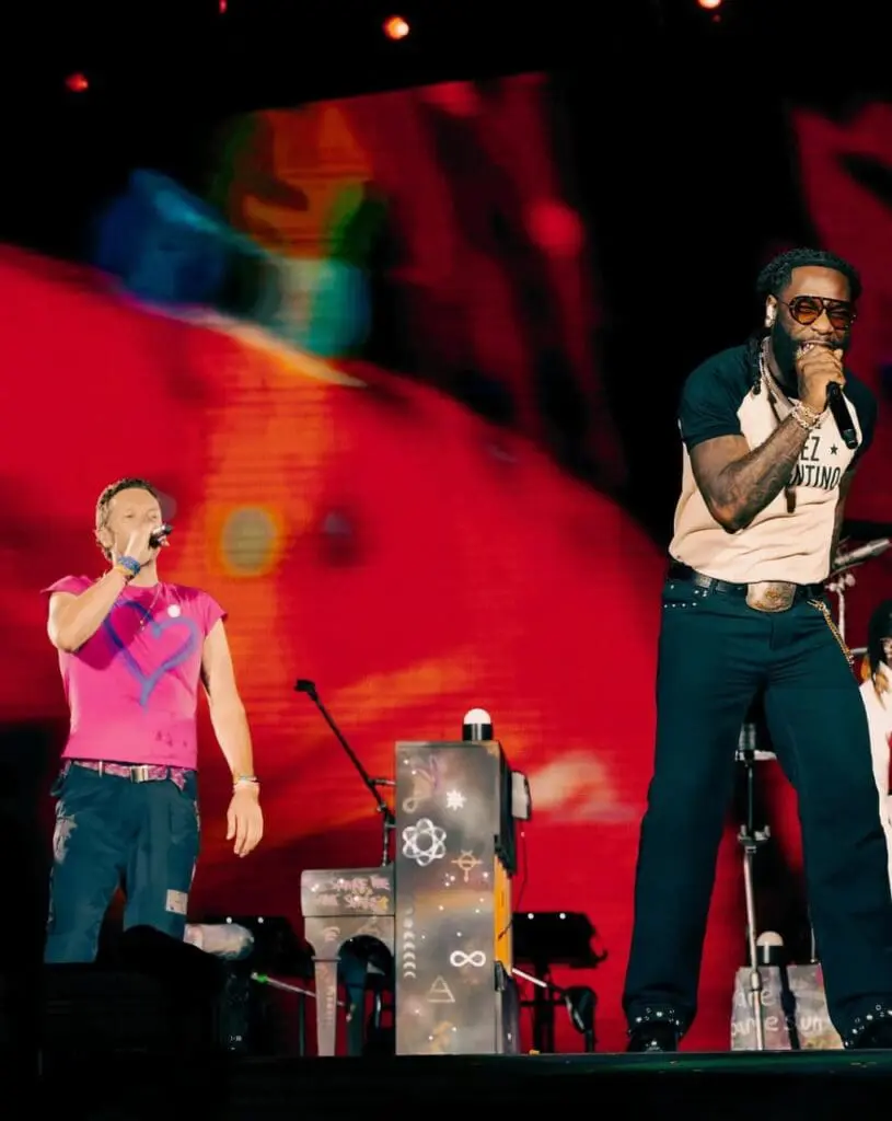 Burna Boy performing with Coldplay on stage
