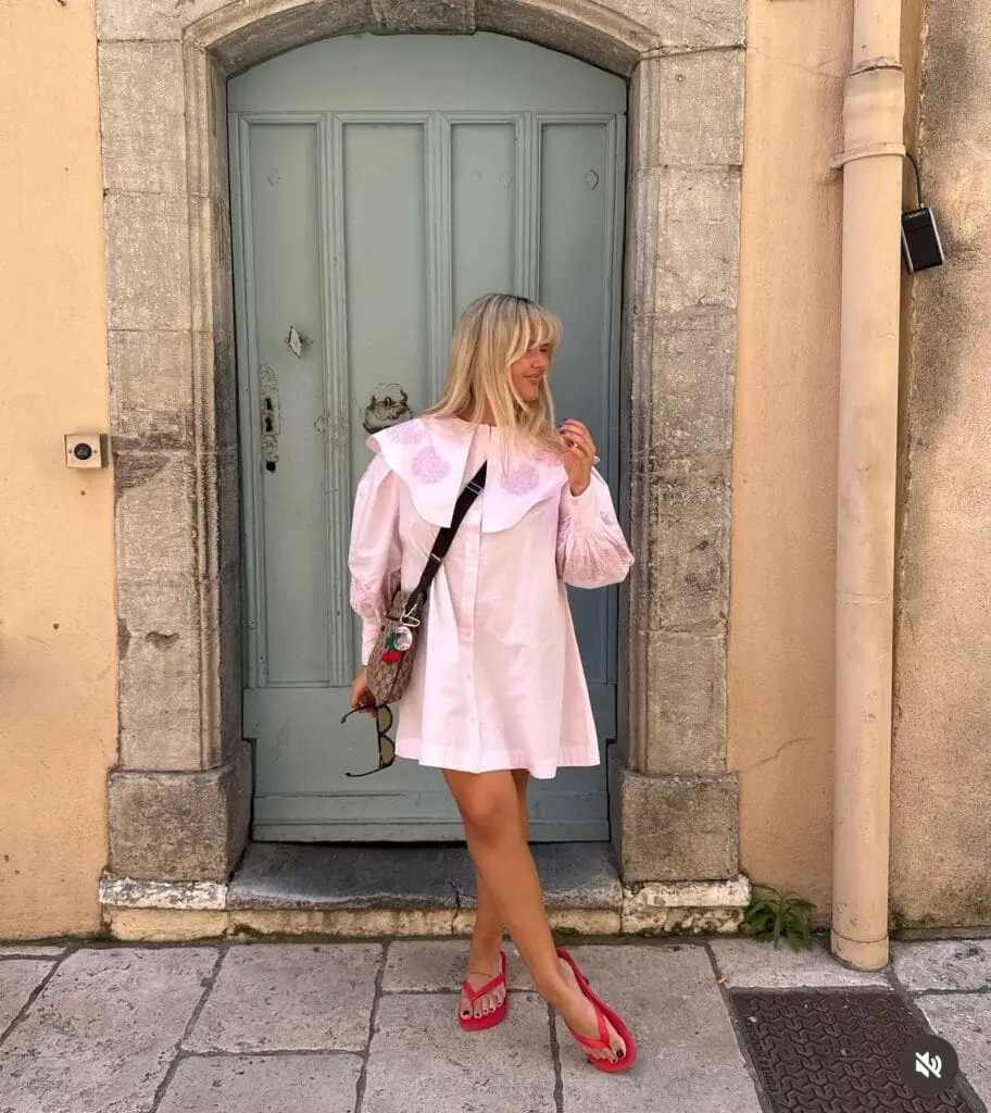 Coquettecore street style in pink shirt dress
