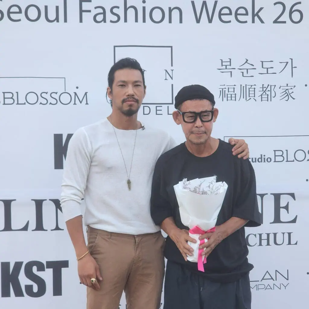 Actor Kim Min with Sling Stone designer at Seoul Fashion Week