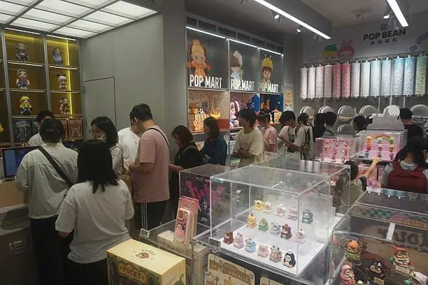 Customers shopping for Labubu toys at Pop Mart
