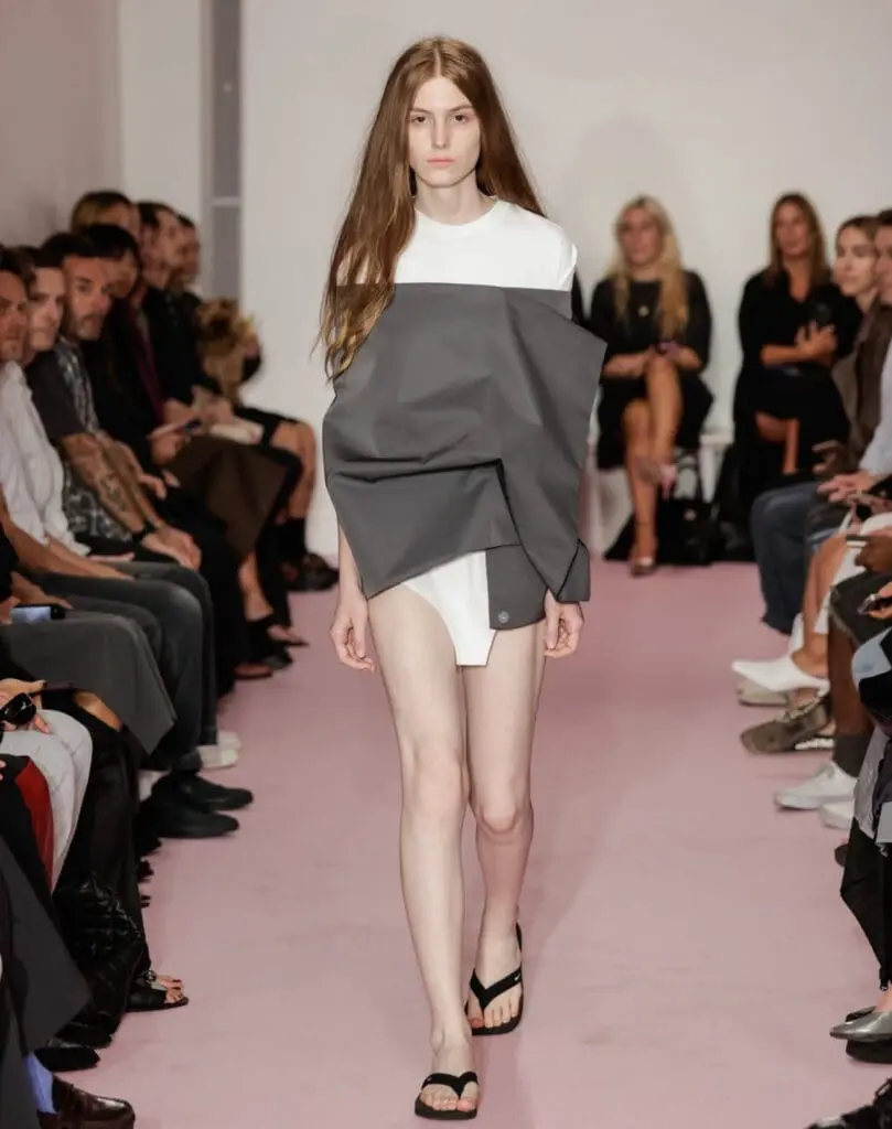 Lii model in grey drape dress NYFW runway debut