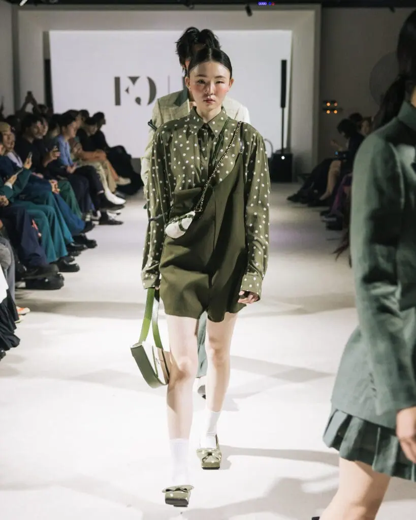 Model in green dress at Milan Loves Seoul SS26 runway