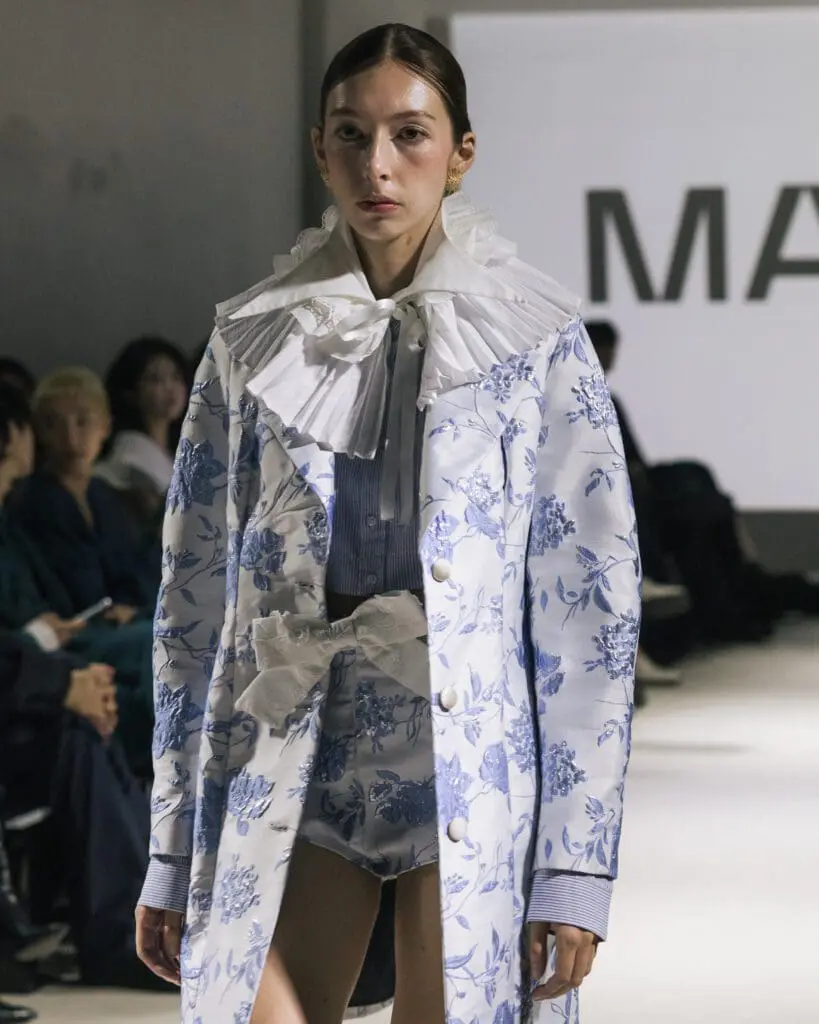 Model in blue floral coat Milan Loves Seoul SS26 Seoul