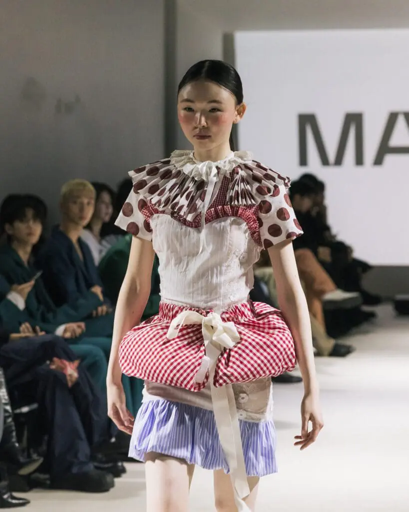 Model in patterned wrap dress Milan Loves Seoul SS26 Seoul