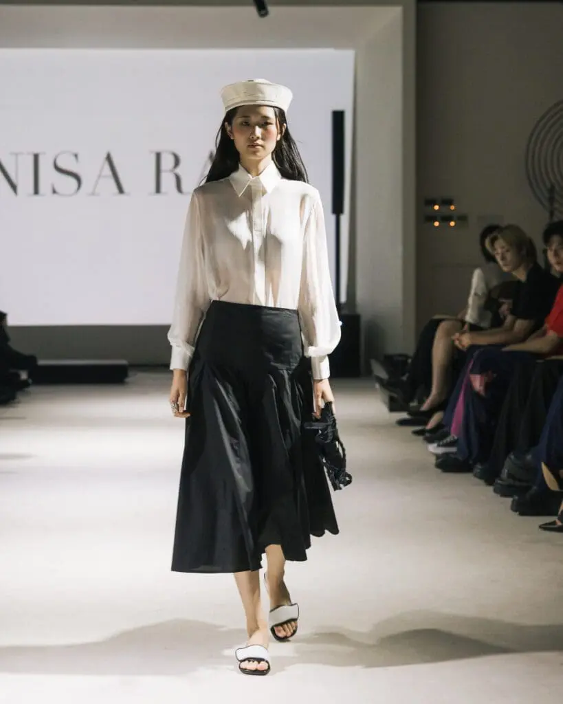 Model in white blouse and black skirt Milan Loves Seoul SS26