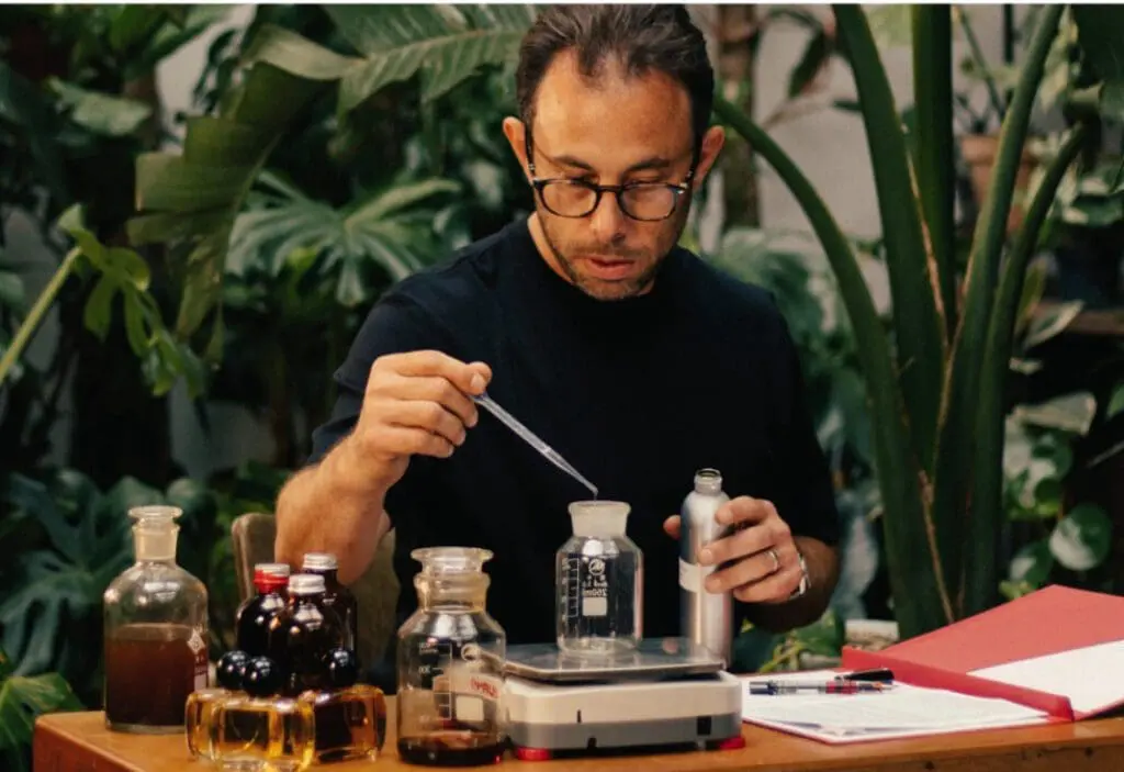 Perfumer working in fragrance creation lab