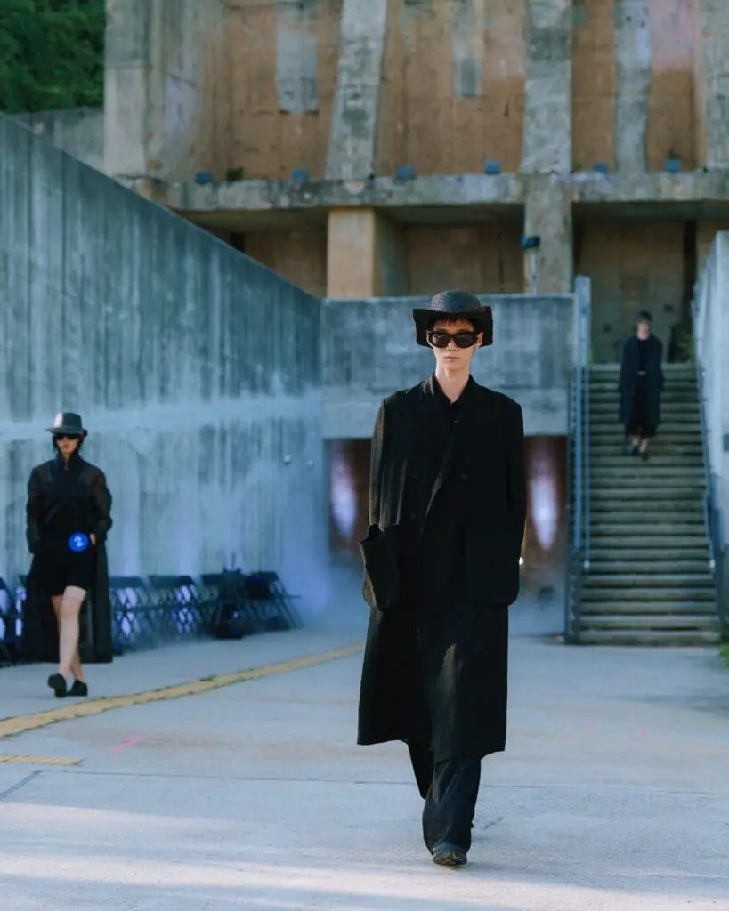 Sling Stone menswear model in long coat SS26 Seoul Fashion Week