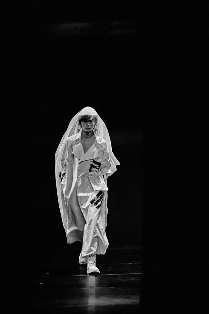 Sling Stone runway model in sculptural look SS26