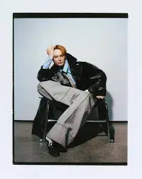 Alex Consani editorial fashion portrait in chair