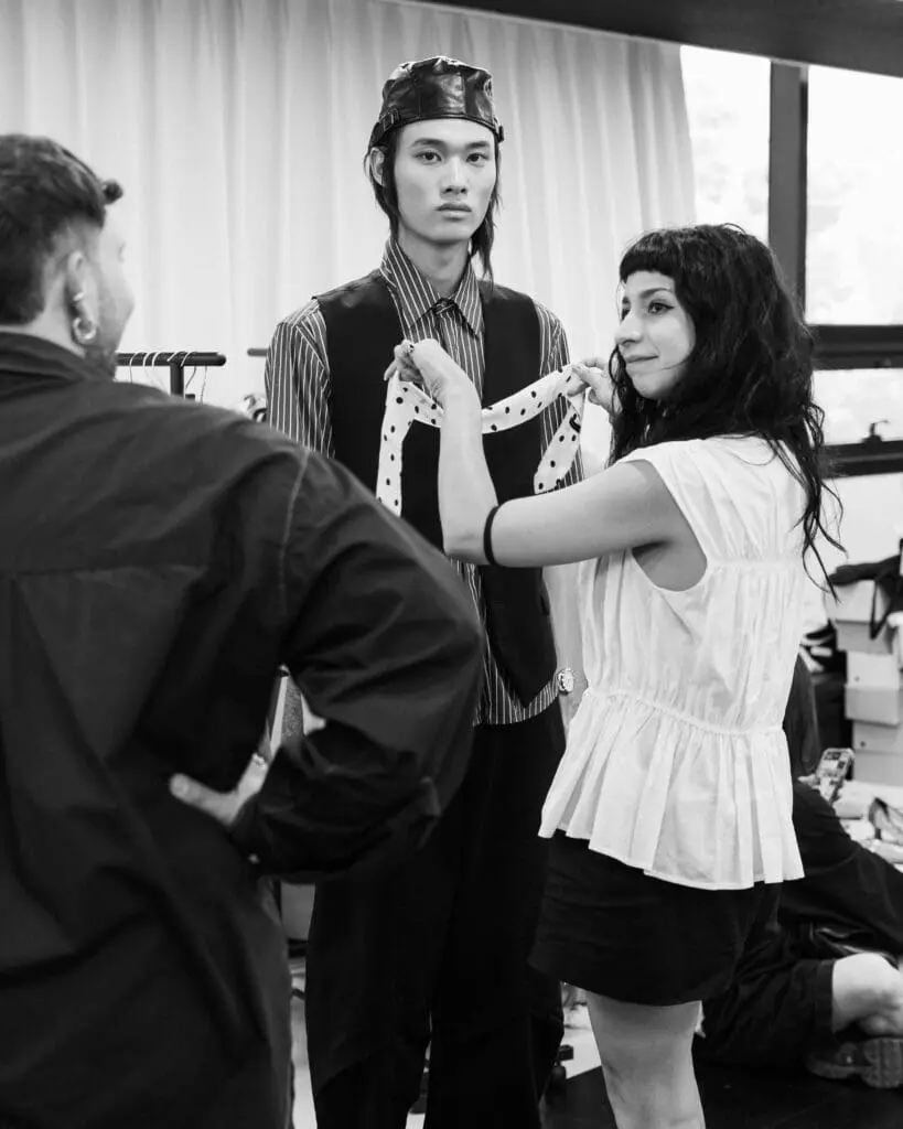 Francesca Cottone adjusting look on male model for CTRL collection