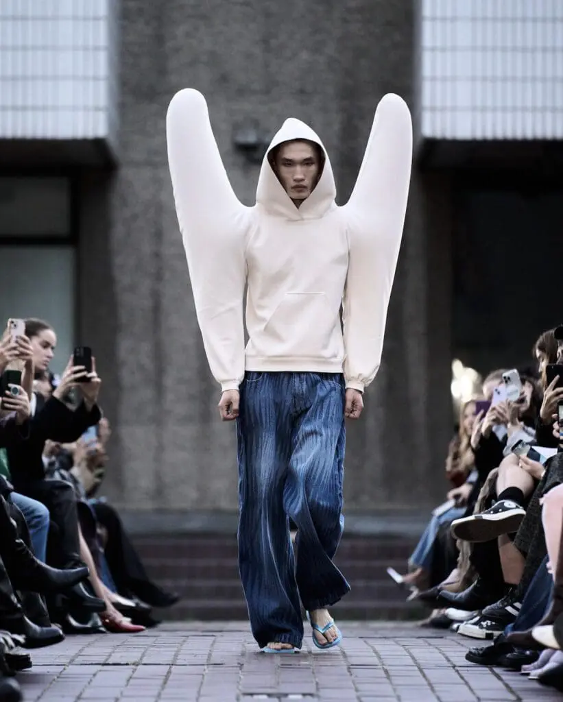 HARRI sculptural white hoodie and denim runway look SS26