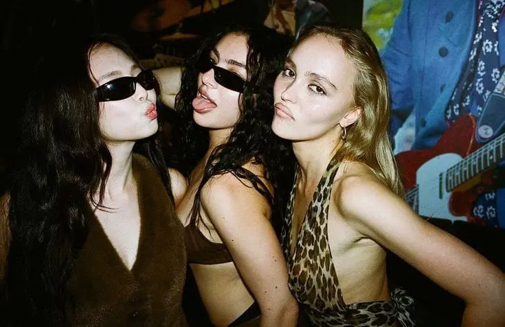 jennie charli xcx and lily-rose depp posing at night out