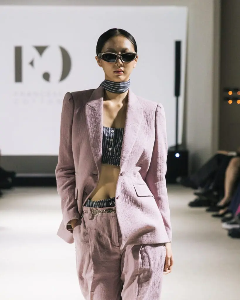 Model Yuna wearing pink textured suit Francesca Cottone CTRL