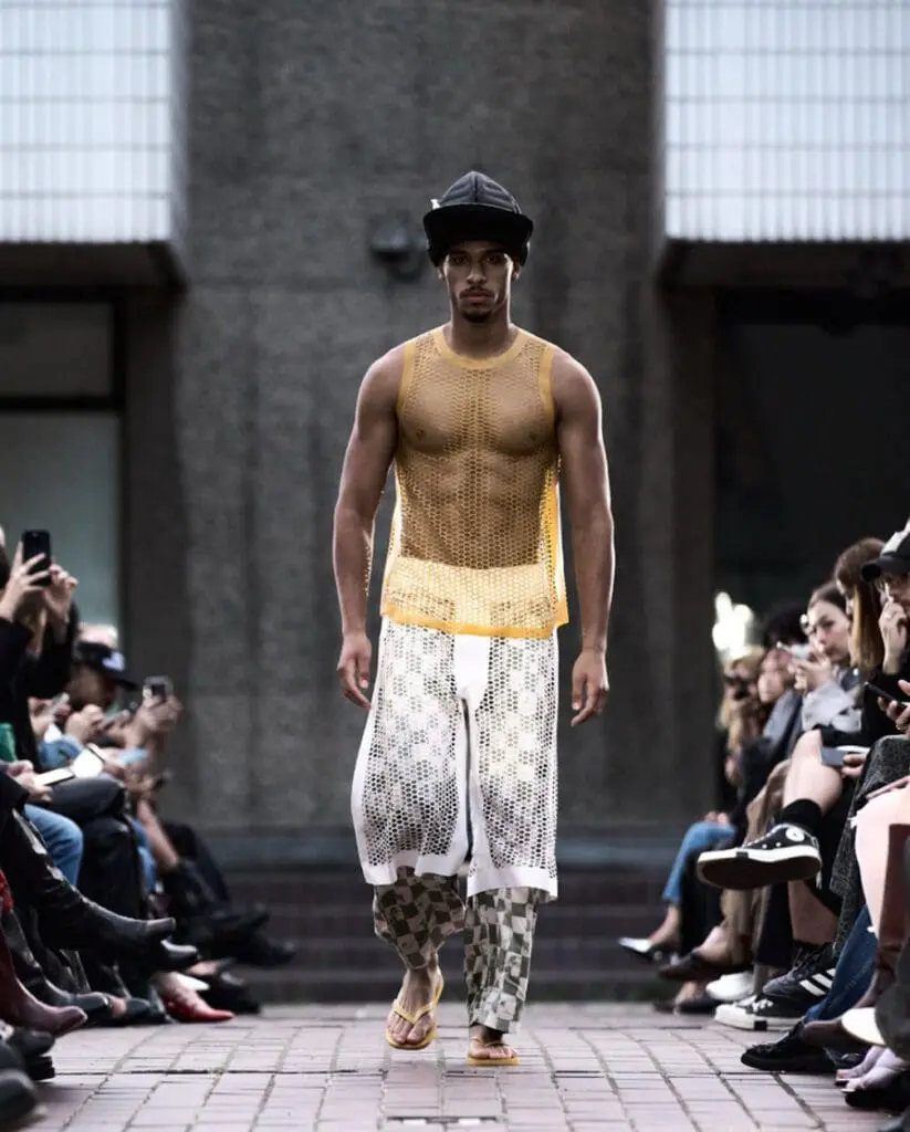 OCTI menswear sheer pattern runway look SS26
