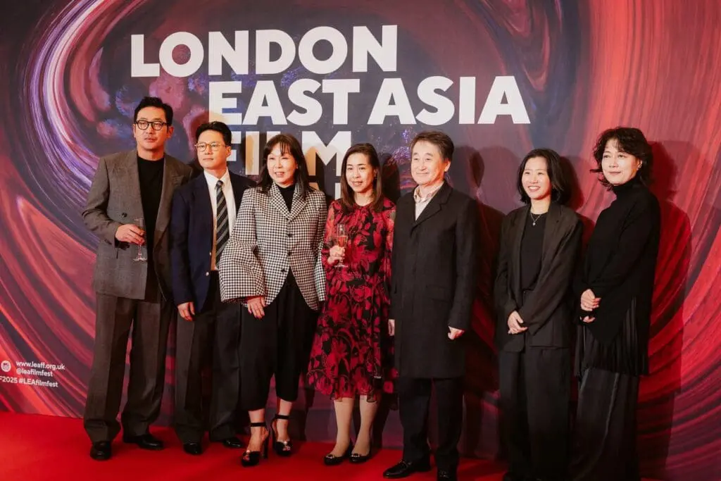 group photo on LEAFF red carpet with backdrop