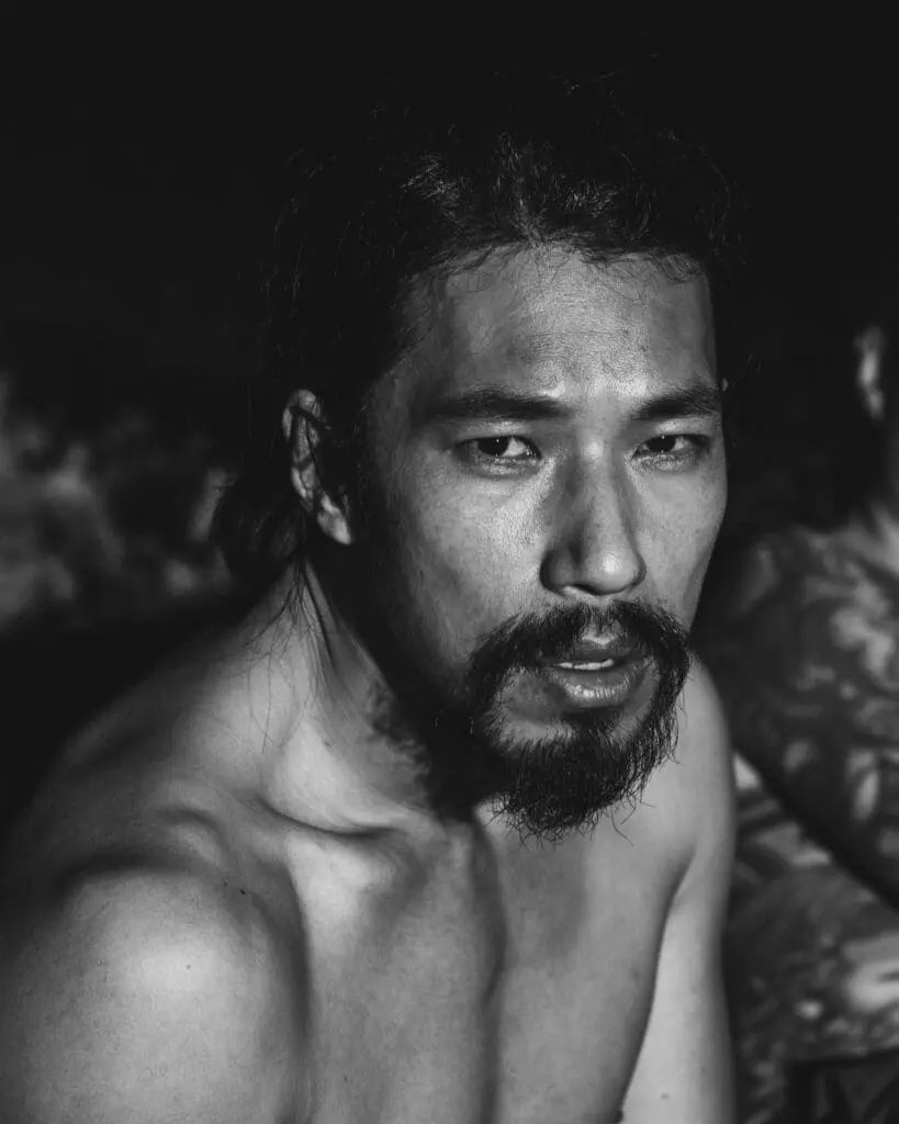 Black and white portrait of a male actor in intense emotional scene