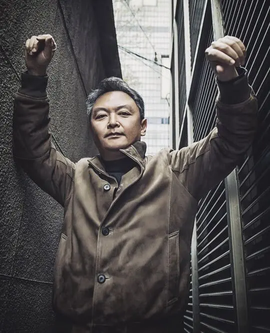 Yoon-sung Kang portrait in cinematic lighting