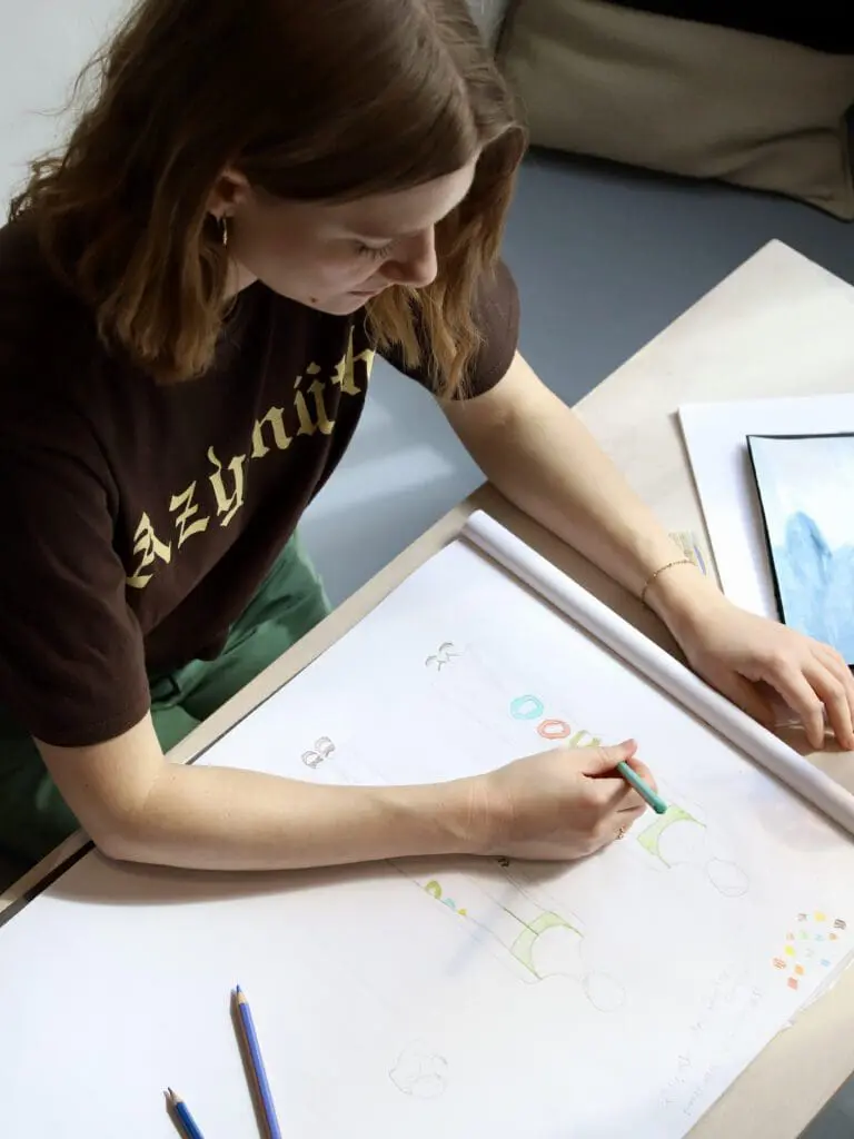 Behind-the-scenes drawing session at a sketching table