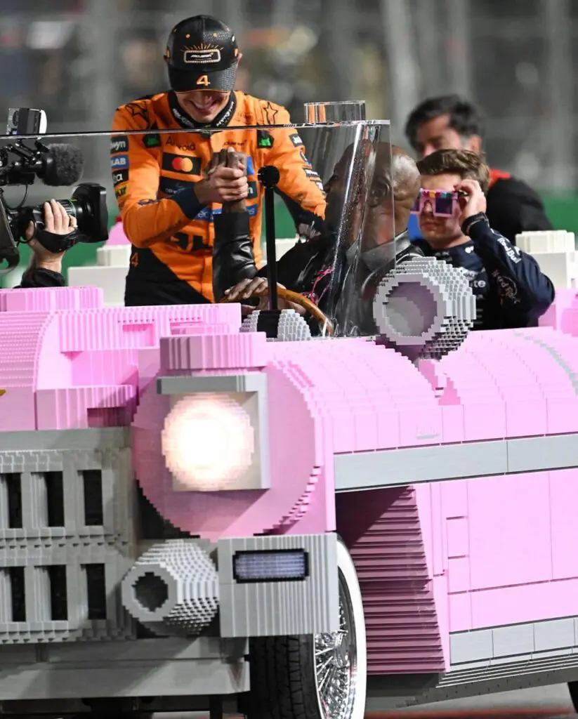 Pink LEGO-style parade car during a Grand Prix weekend