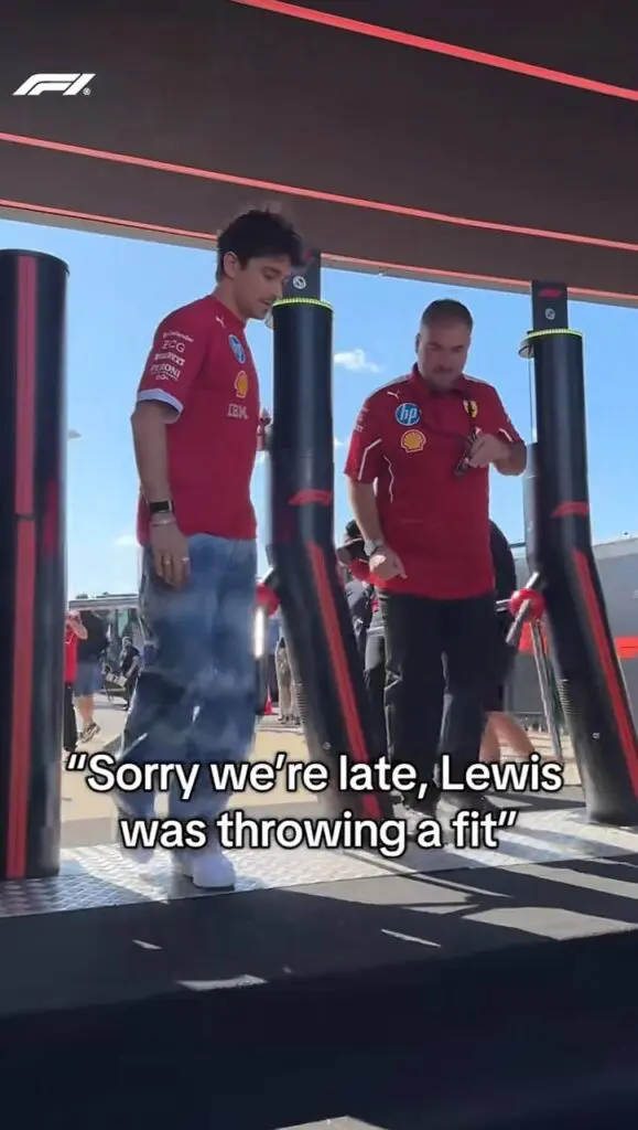 F1 paddock humor moment with text overlay