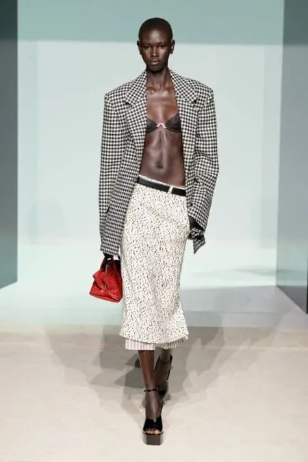 The Attico SS26 office-siren lingerie look on runway