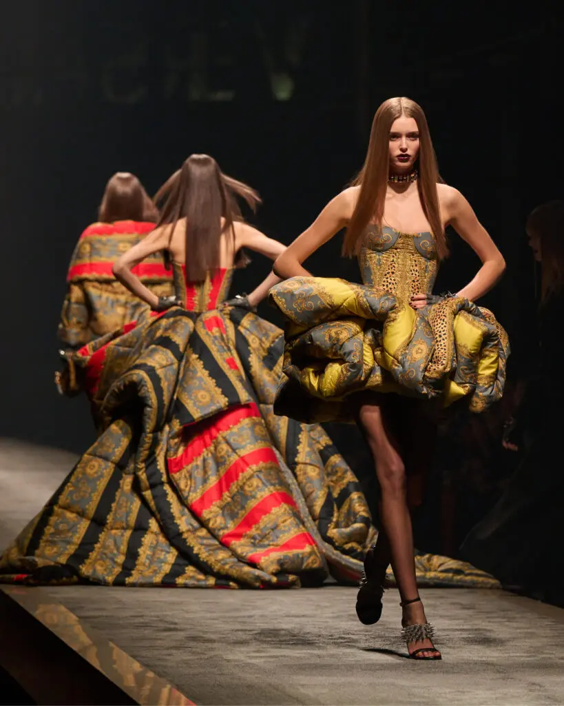 Versace runway baroque quilted gowns in gold and red