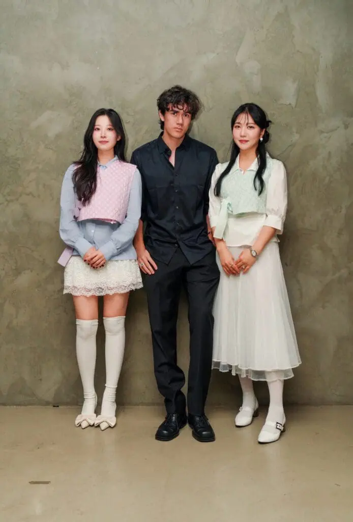 Group portrait of executive with two ambassadors