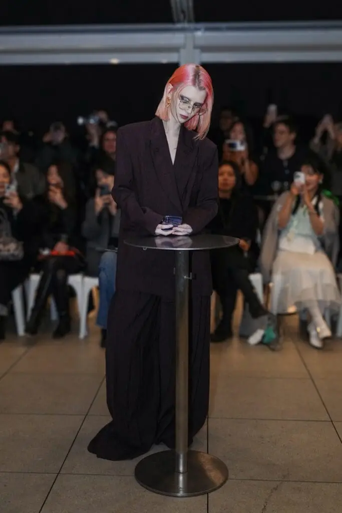 Keynote speech at podium during runway event