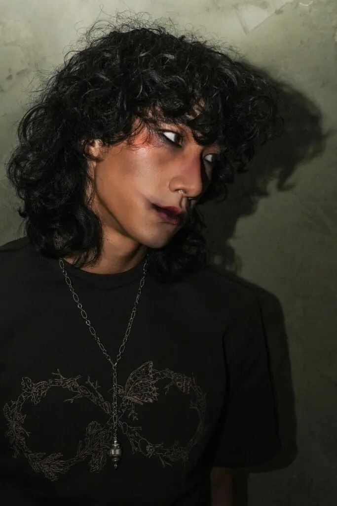 Close-up studio portrait with artistic makeup