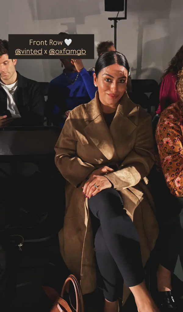 Front row at Vinted x Oxfam wearing suede trench