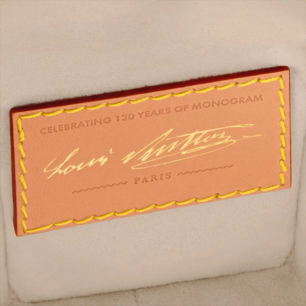 Louis Vuitton 130 years monogram label close-up