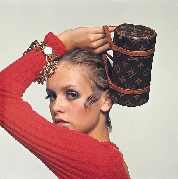 Editorial portrait with Louis Vuitton monogram hatbox case