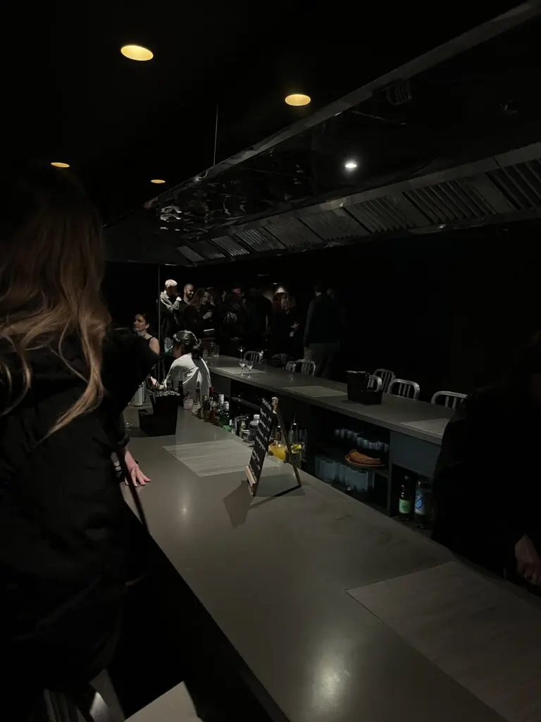 women-first dating event london bar low light crowd